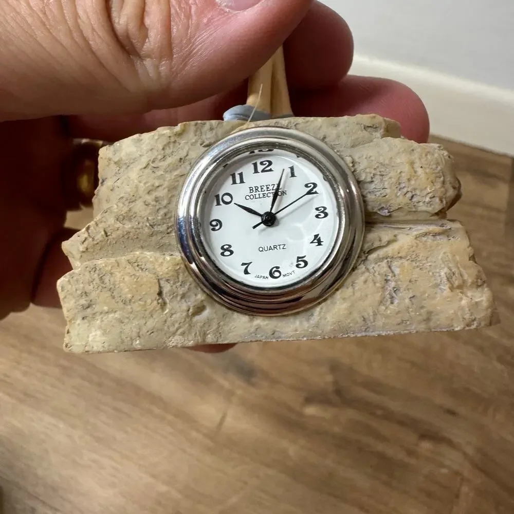 Vintage Miniature Desk Clock Quartz Japan Fairy/ Angel on Rock Breeze Collection